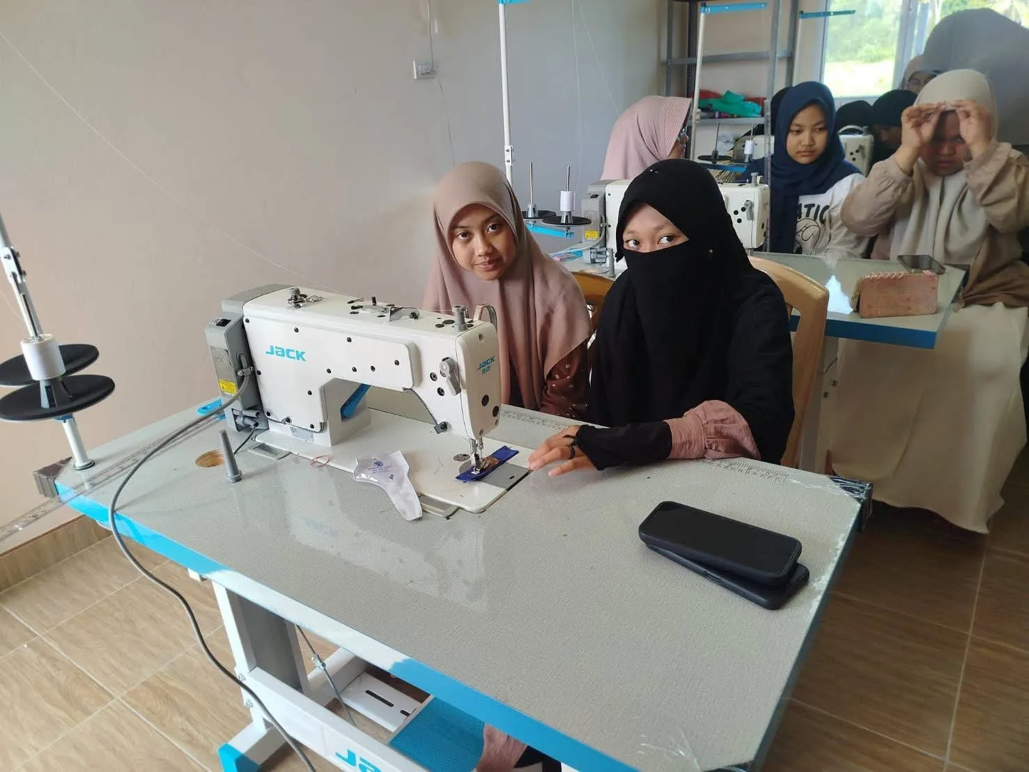 Holiday Activities: Students Develop Practical Sewing Skills